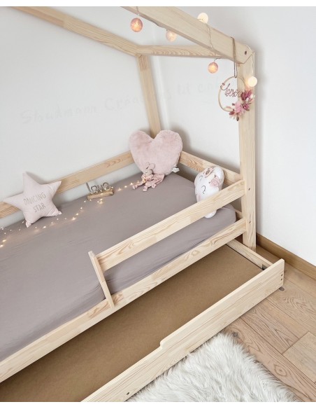 Lit gigogne inversé avec barrière amovible Lit gigogne inversé avec barrière amovible